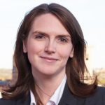 A photo of woman in a suit